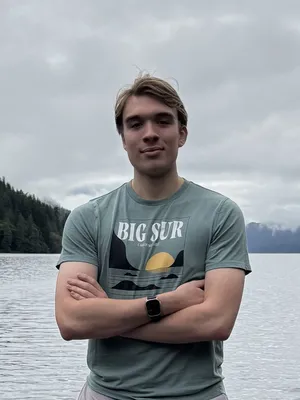 Me standing on a dock in front of a lake